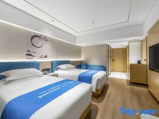Xinyue Hotel - Chambres