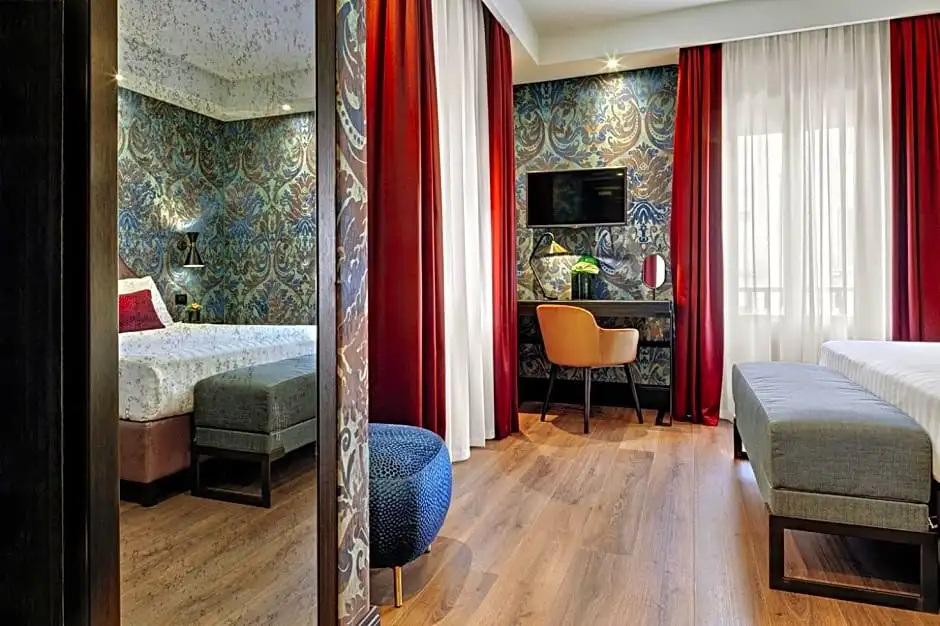 Hotel American Dinesen - Chambres