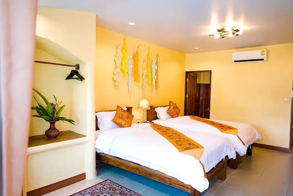 E-outfitting Pai Resort - Chambres