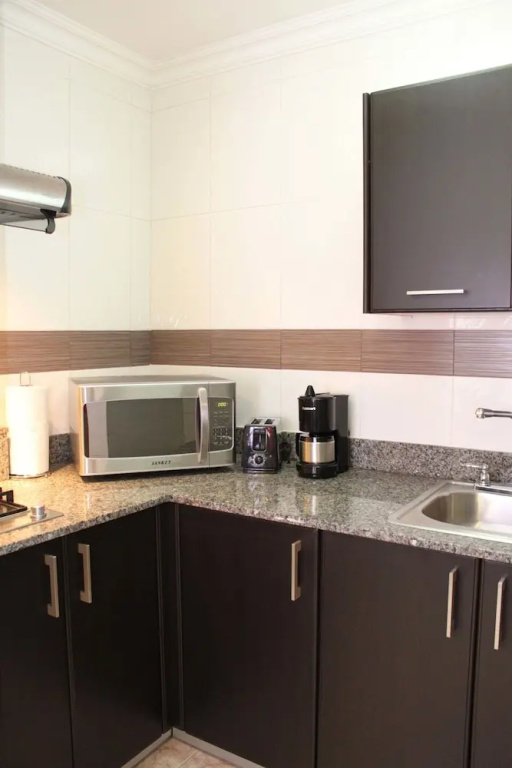 Aparthotel Sevilla Suites - Chambres
