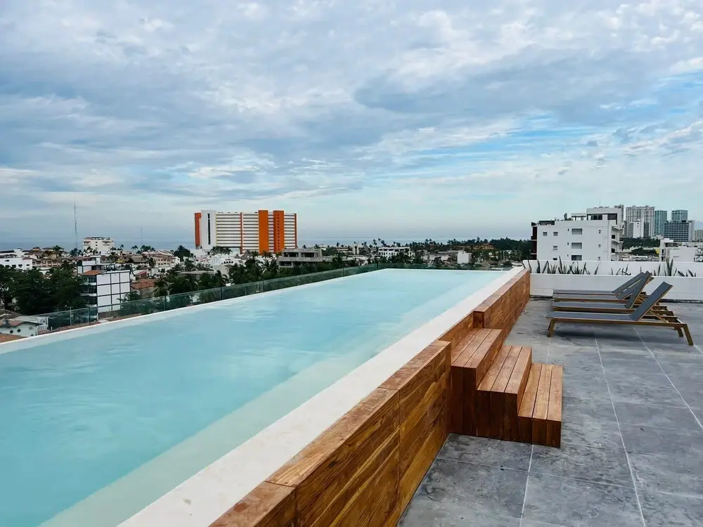 Serene Stylish Stay Roof Pool and Lounge