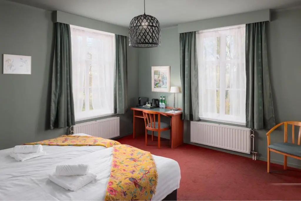 Green White Hotel - Chambres