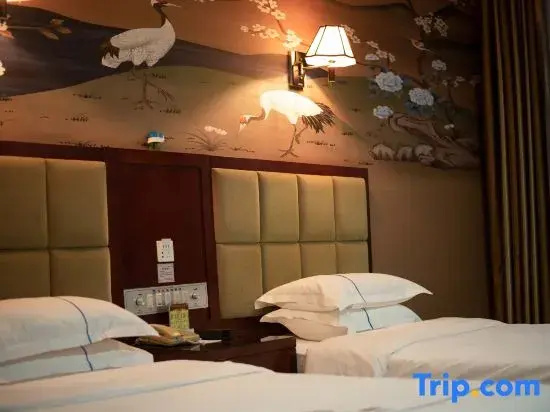 Wanjia Hotel - Chambres