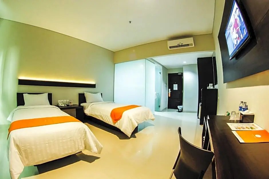 Alpha Hotel - Chambres