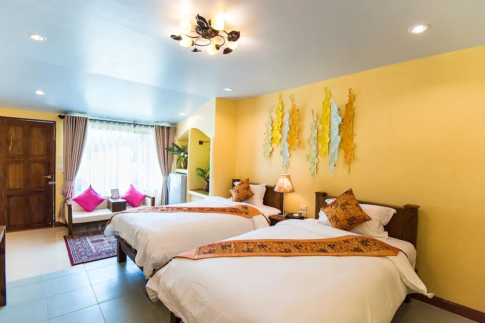 E-outfitting Pai Resort - Chambres