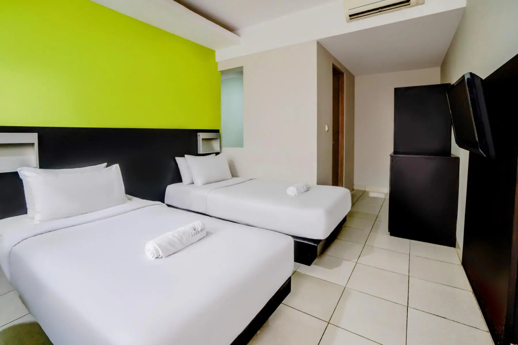 LeGreen Suite Pejompongan - Chambres