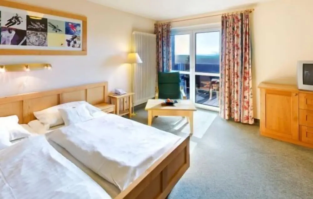 Jens Weissflog Appartementhotel - Chambres