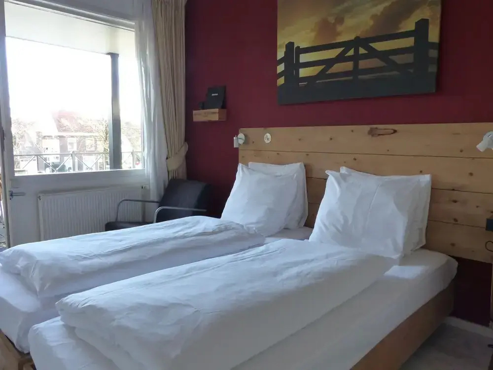 Hotel De Stadsherberg - Chambres