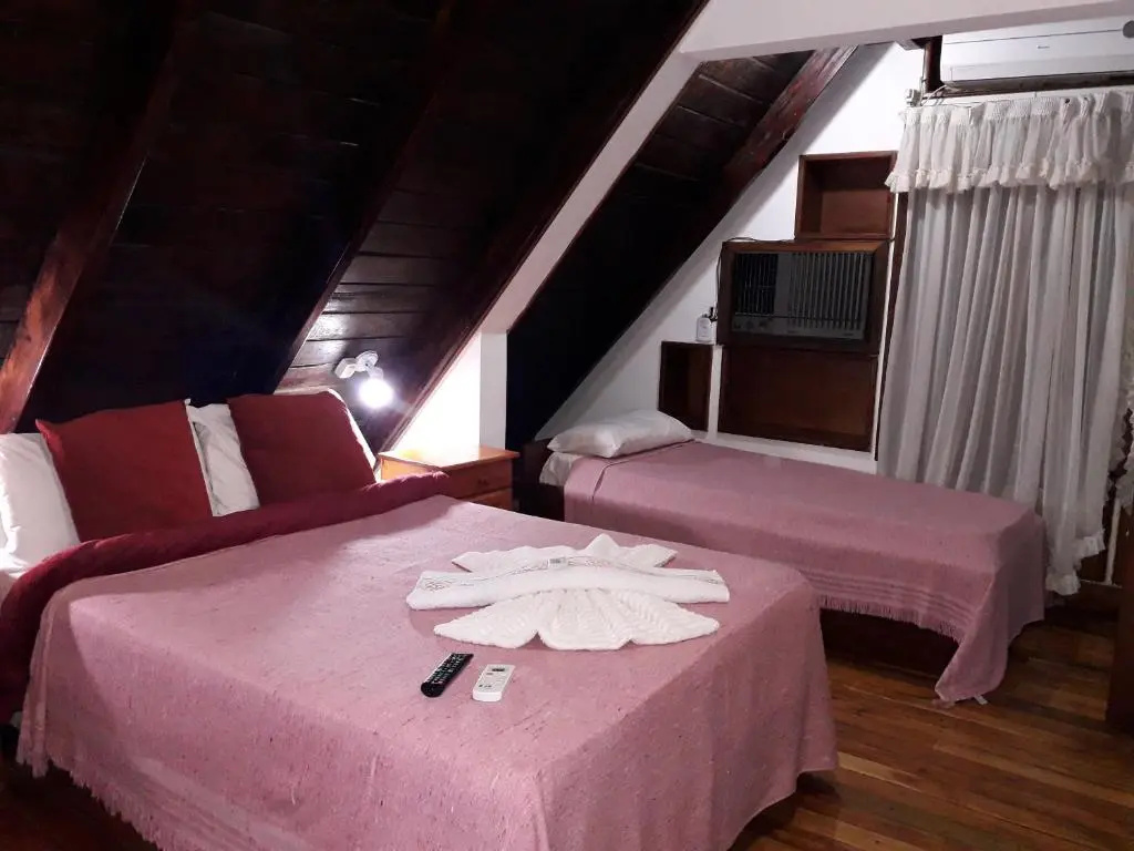 Petit Hotel Caraguata - Chambres