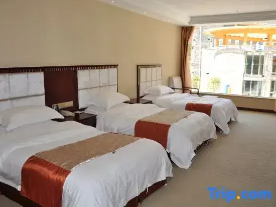 Wolong International Hotel - Chambres