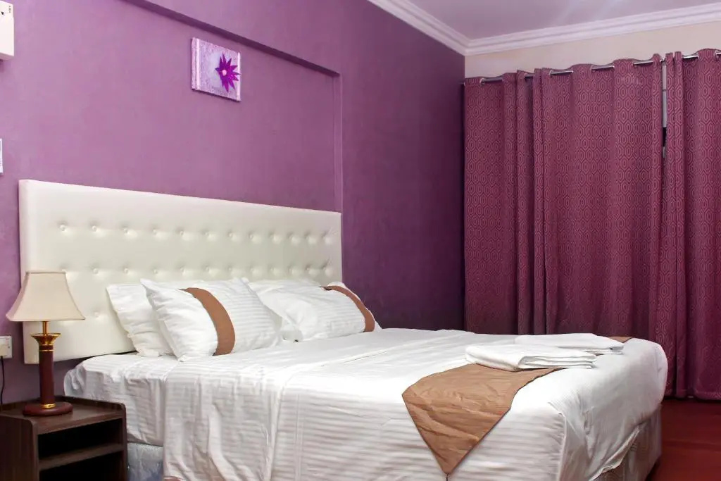 Delmon Hotel Apartments - Chambres
