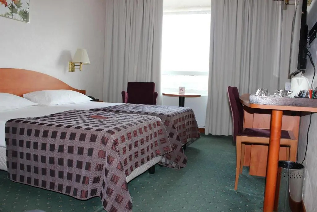 Ramada by Wyndham Bucharest Parc - Chambres