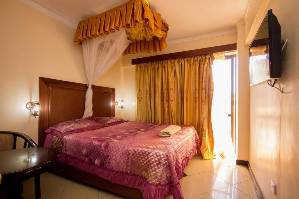 New Zonic Hotel - Chambres