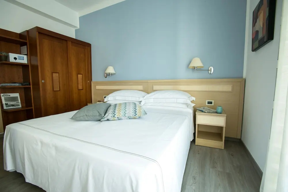 Arc en Ciel Hotel - Chambres