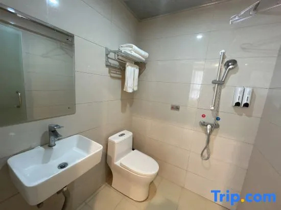 Huajun Hotel - Chambres
