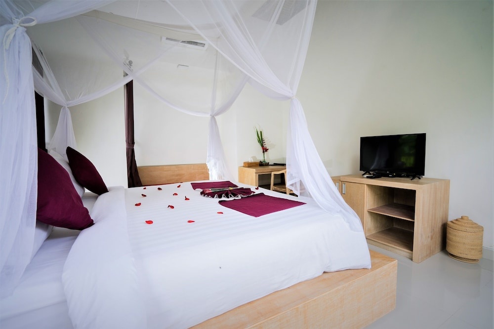 Отель Three Gold Luxury Private Villa в Тегаллаланге