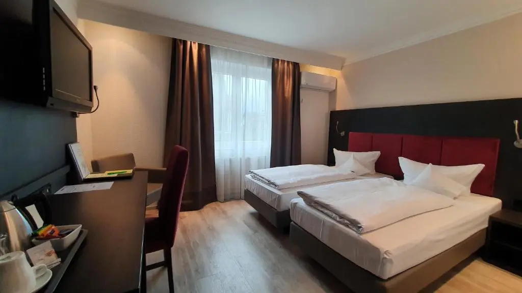 Astralis Hotel Domizil - Chambres
