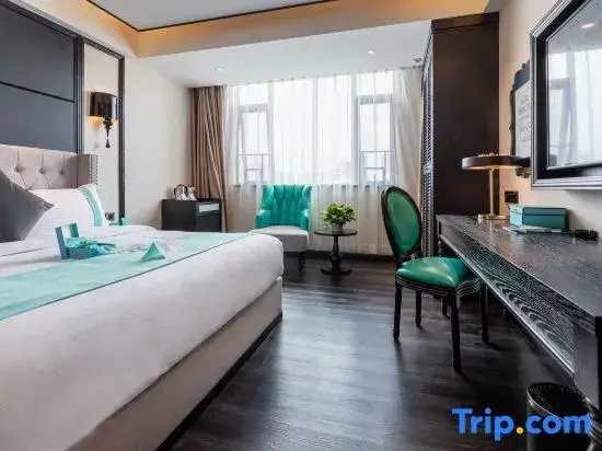 Xinliyuan Hotel - Chambres