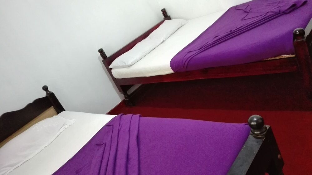 Трёхместный номер Deluxe c 1 комнатой с видом на горы односпальная кровать в Kumara Sevana - The Family Cottage