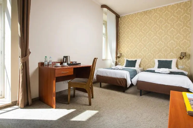 Aparthotel Globus - Chambres