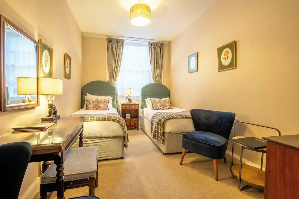 Corinium Hotel & Restaurant - Chambres