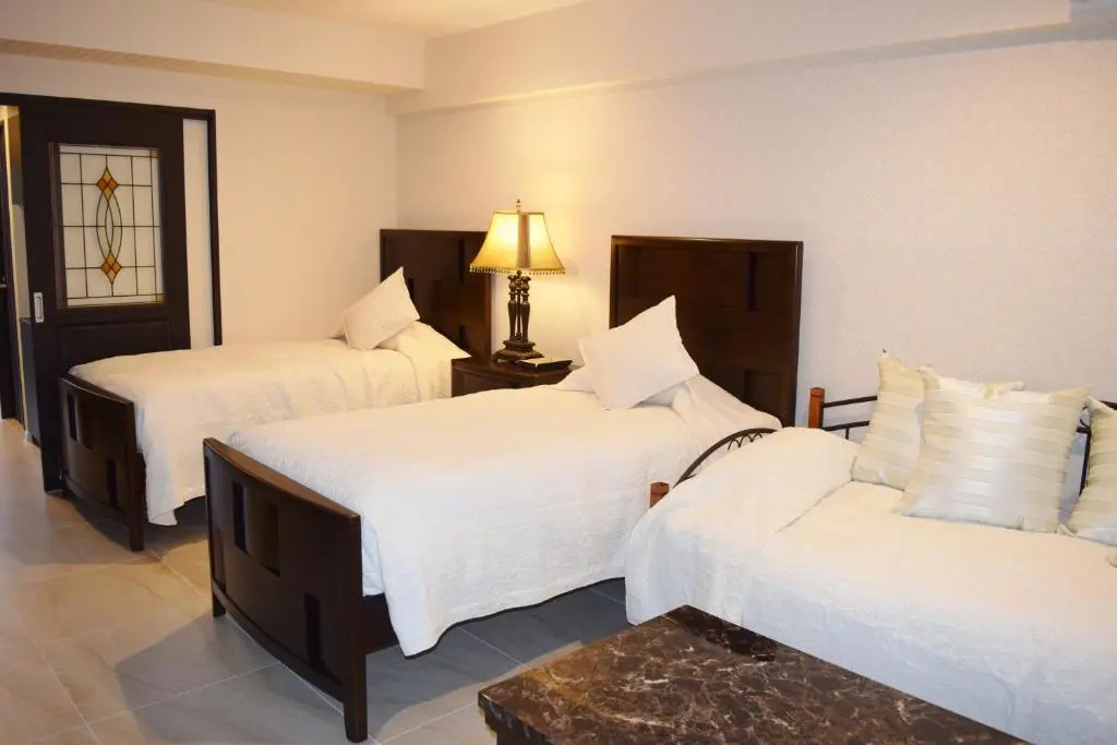 Wisteria Condominium Resort - Chambres