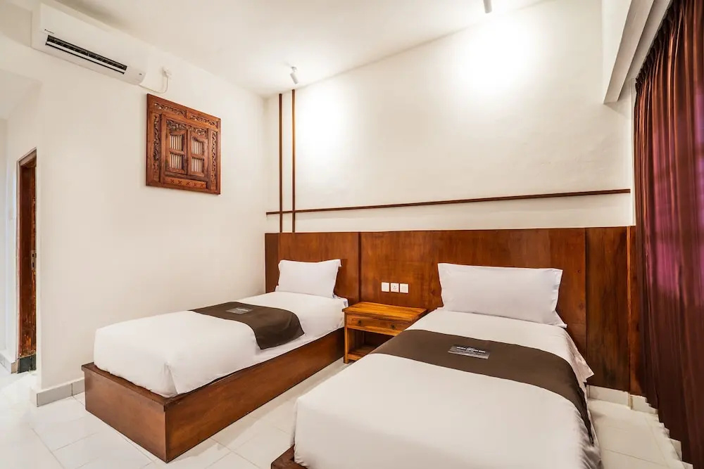 Suka Beach Inn - Chambres