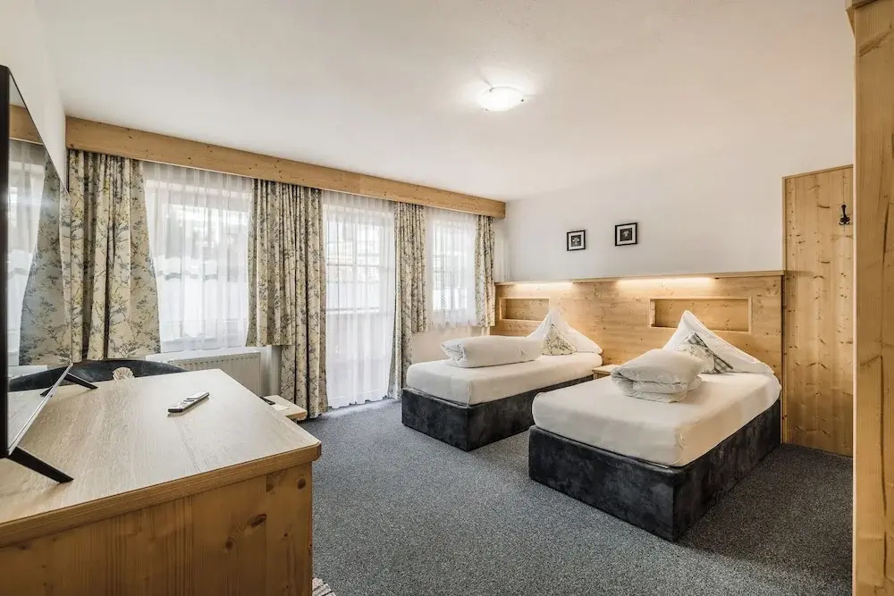 Andre Arnold - Boutique Pension - Chambres