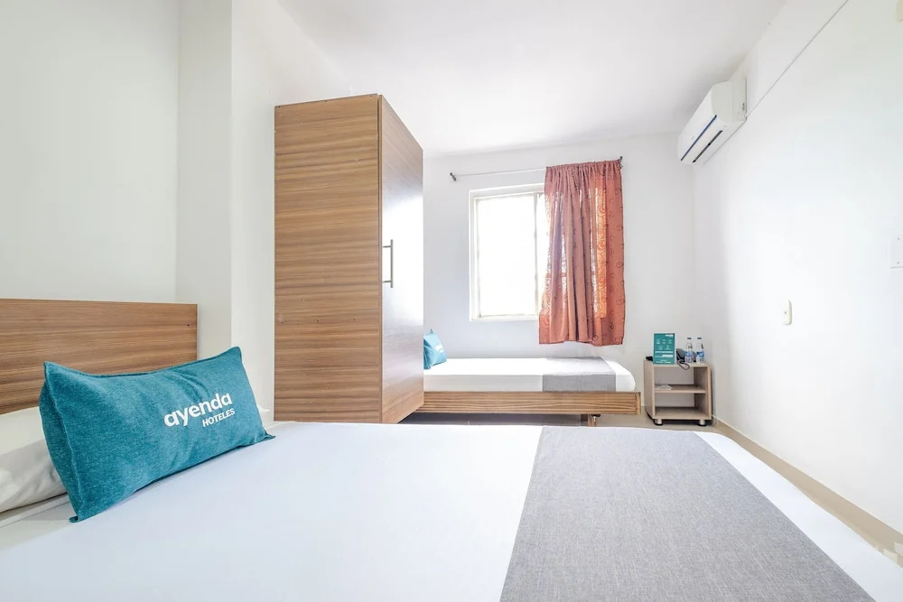 Hotel Metropolitana Plaza - Chambres