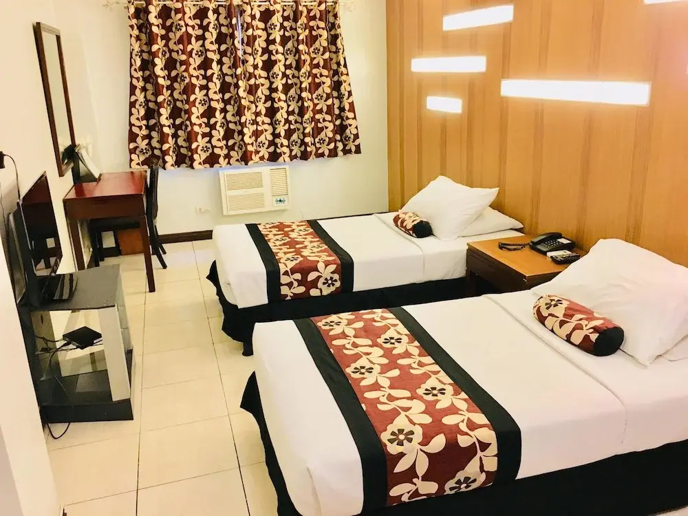 Jupiter Suites - Chambres