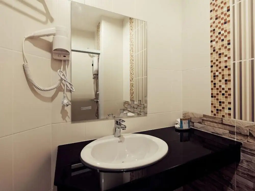Excella Hotel - Chambres