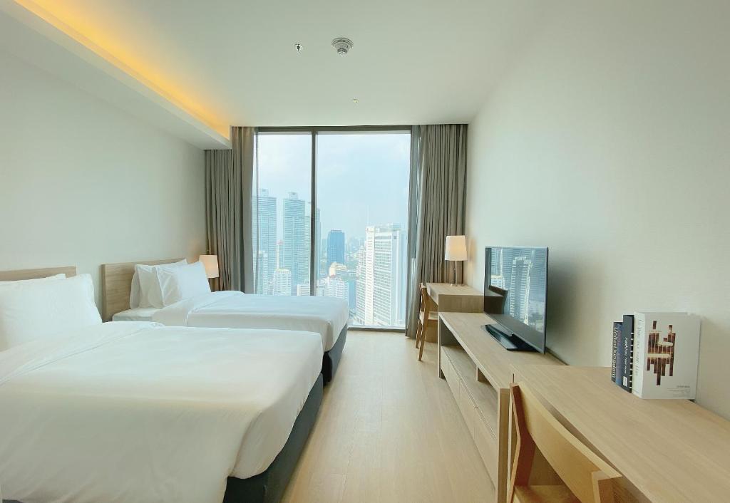 Апартаменты Executive с 2 комнатами в Oakwood Suites Bangkok