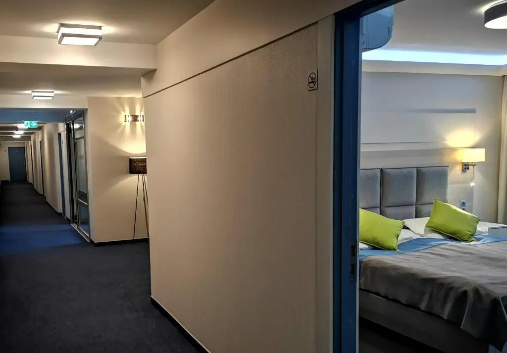 Amrita Hotel - Chambres