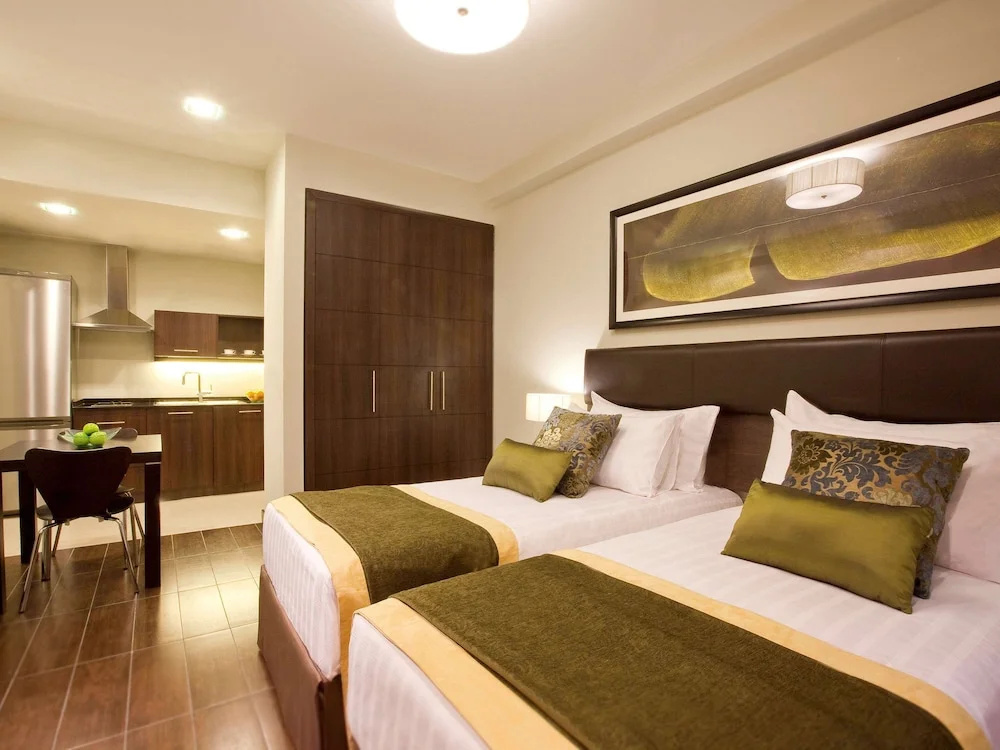 Movenpick Hotel Apartments Al Mamzar Dubai - Chambres