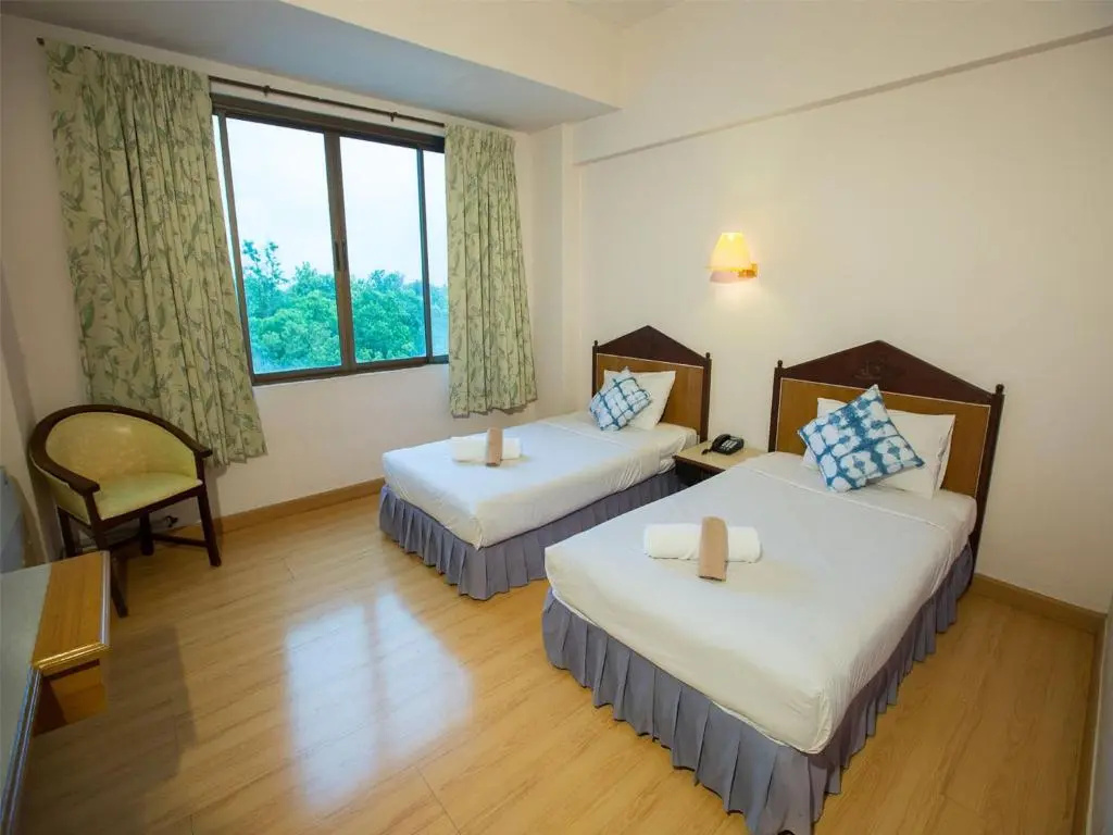 Phrae Nakara Hotel - Chambres
