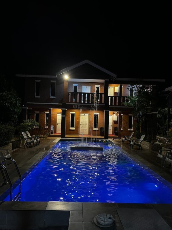 Deluxe Quadruple room with balcony and with pool view