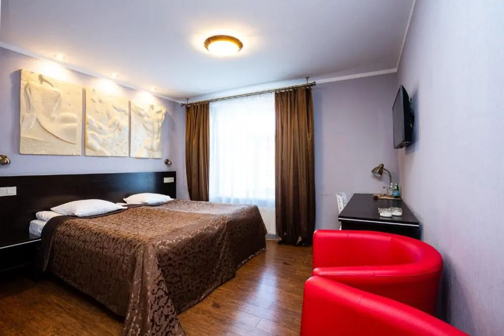 Primo Hotel - Chambres