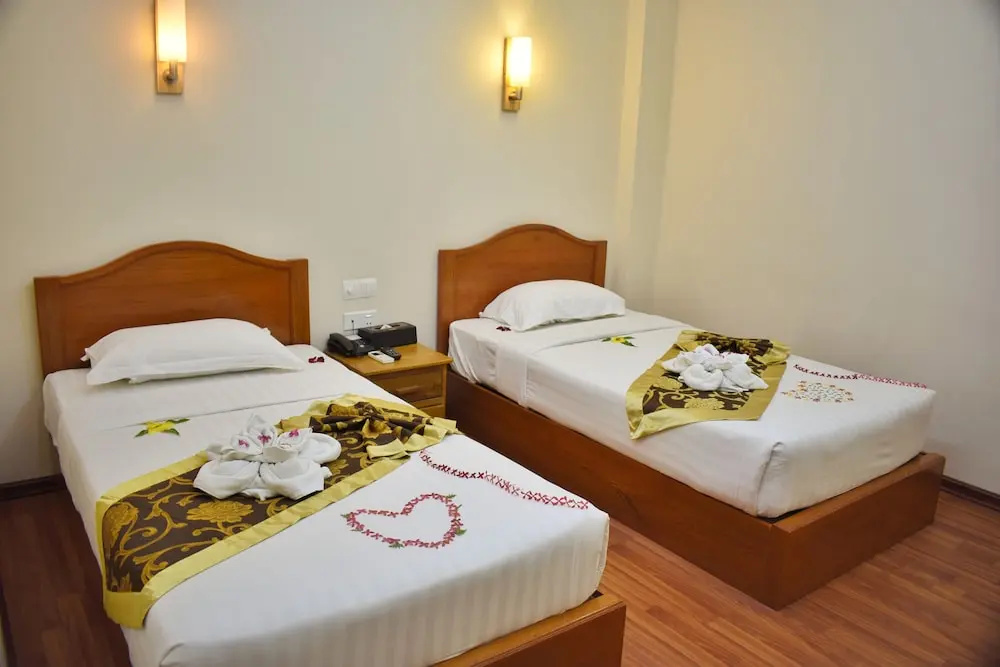 Shwe Poe Eain Hotel - Chambres