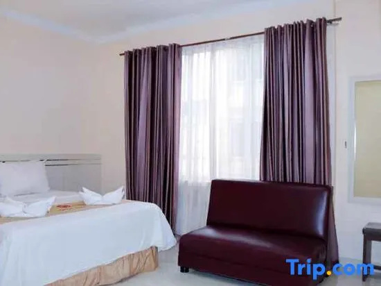 Griya Hotel - Chambres
