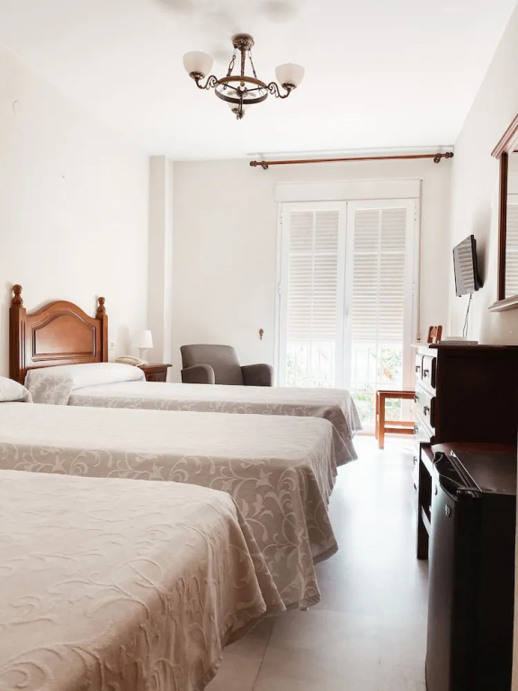 Hotel Cafe La Morena - Chambres