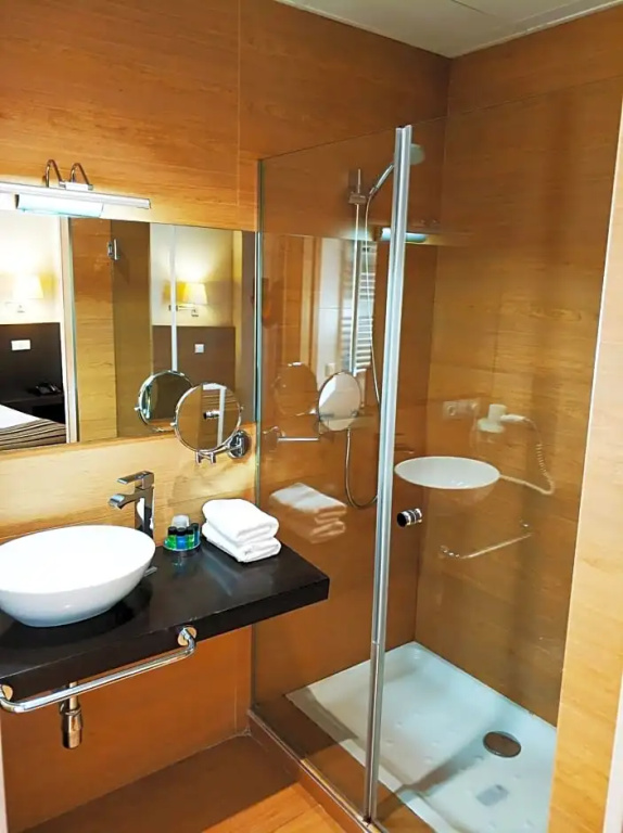 Hotel Puerta Del Arco - Chambres