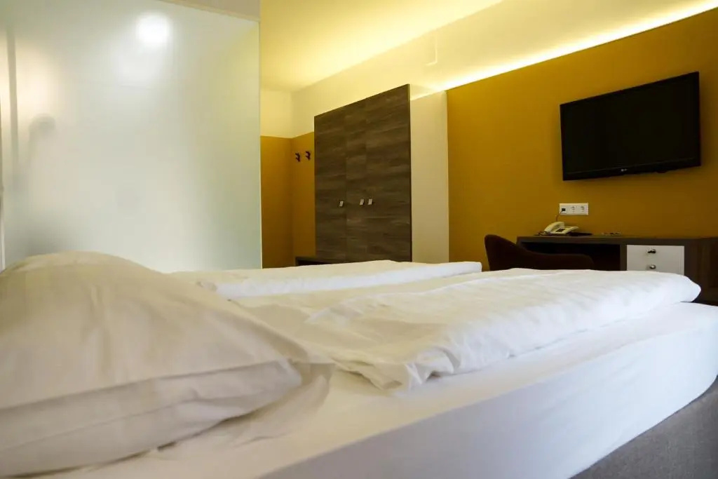 Simon - Hotel & Café - Chambres