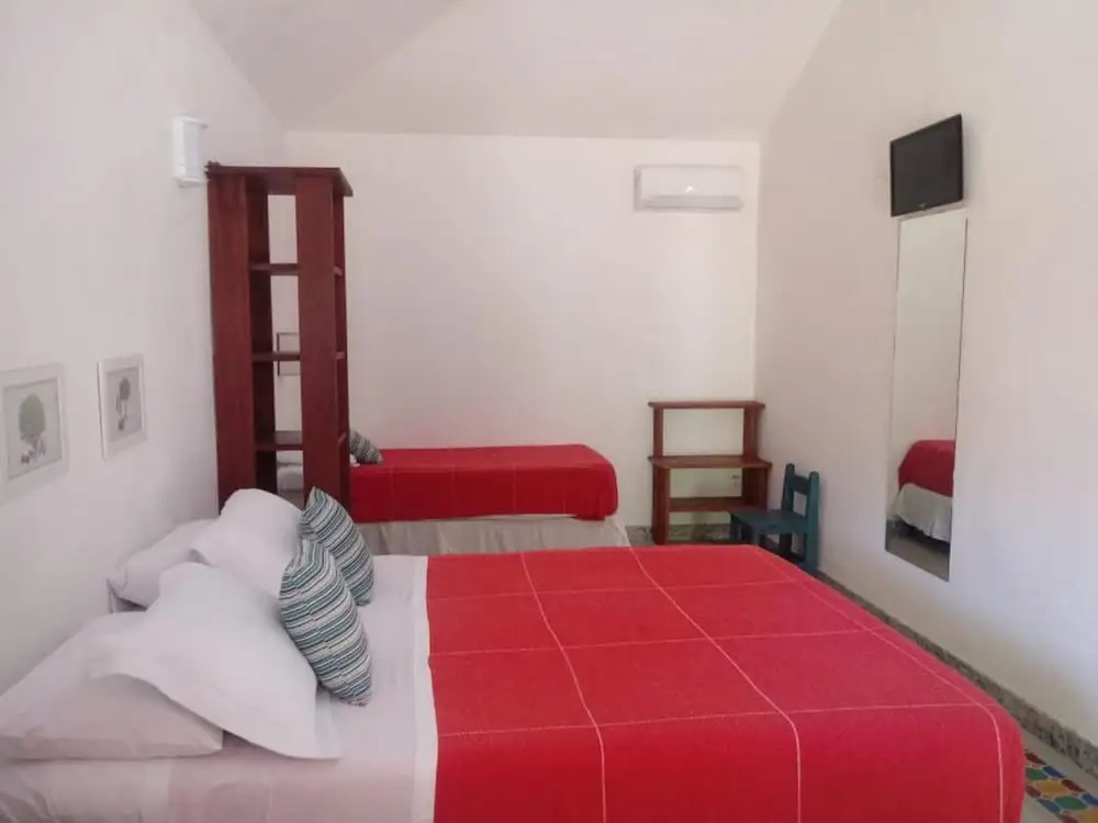 Standard Triple room with garden view