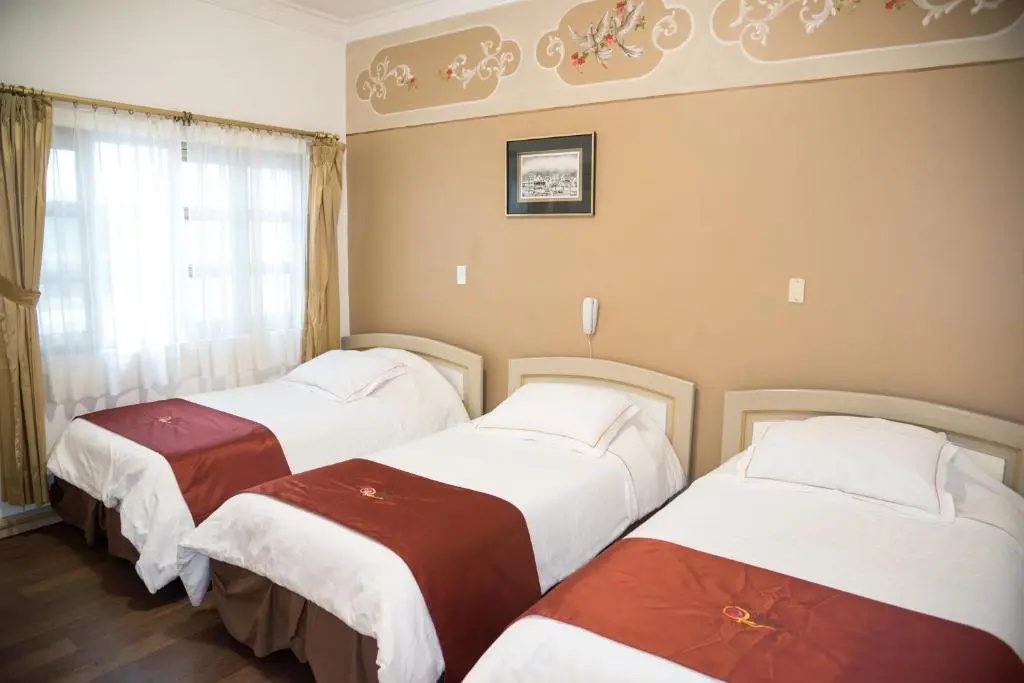 Hostal La Orqudea - Chambres
