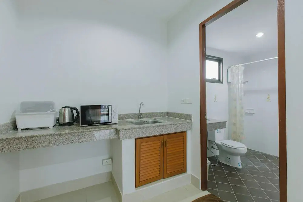 Двухместная студия с балконом двуспальная кровать в Kataonsea Bungalows