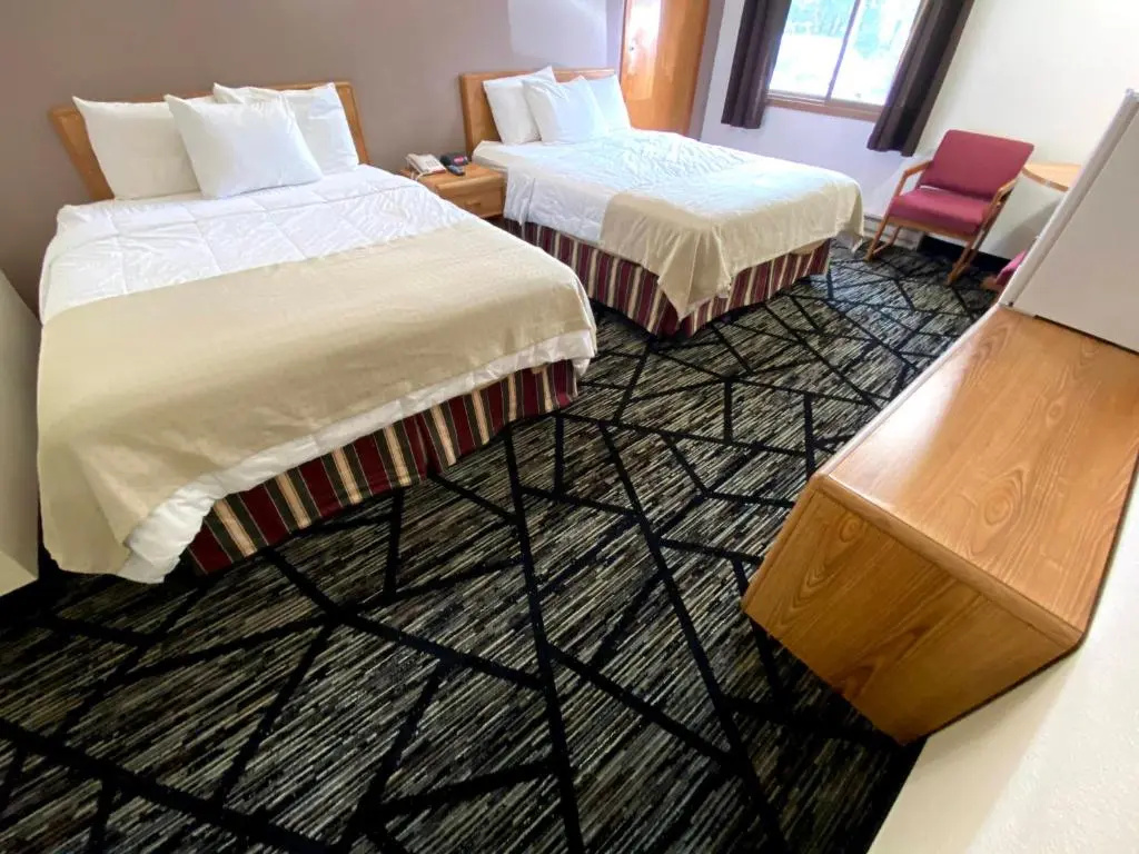 Woodlands Inn & Suites - Chambres