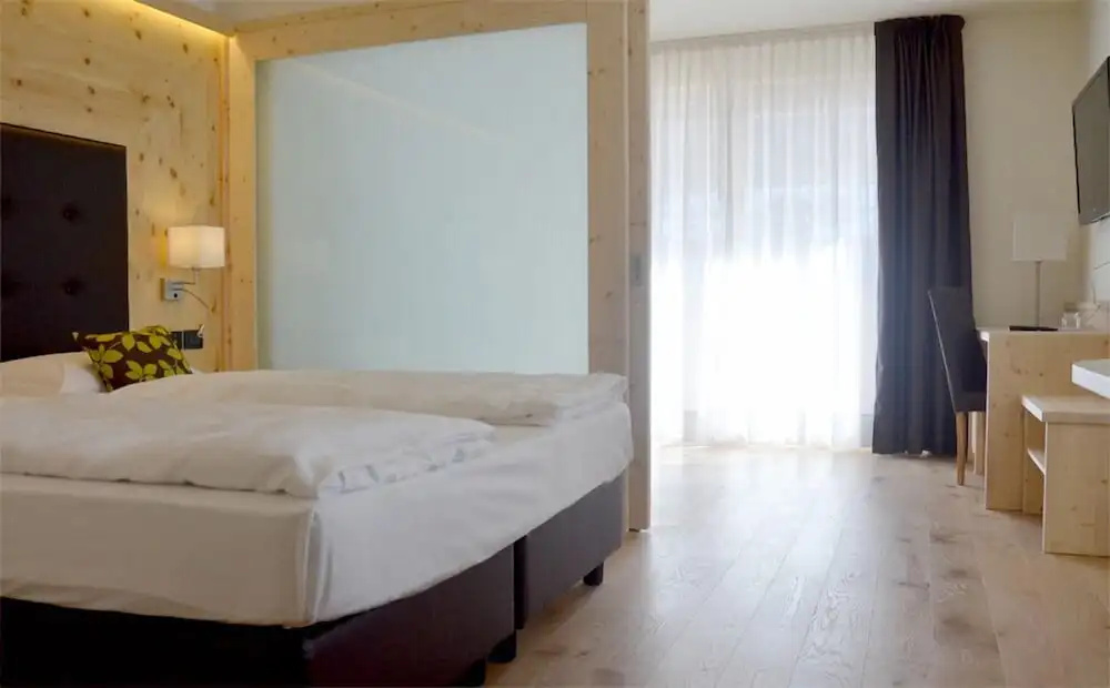AlpHoliday Dolomiti Wellness - Chambres