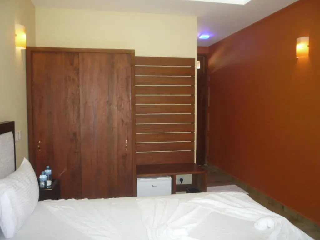 Deluxe Double room with balcony and beachfront full double bed