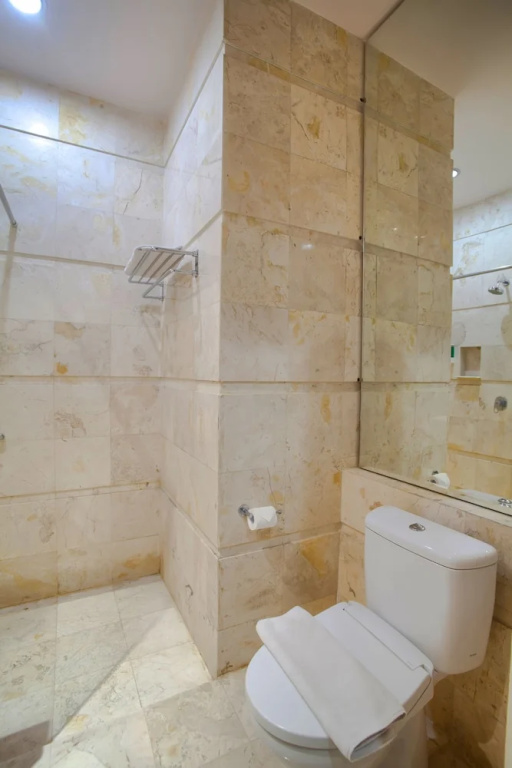 Swiss-Belcourt Makassar - Chambres
