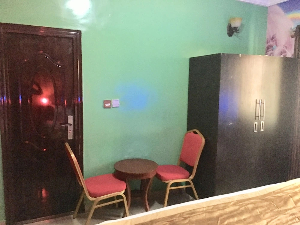 Definite Destiny Hotel - Chambres